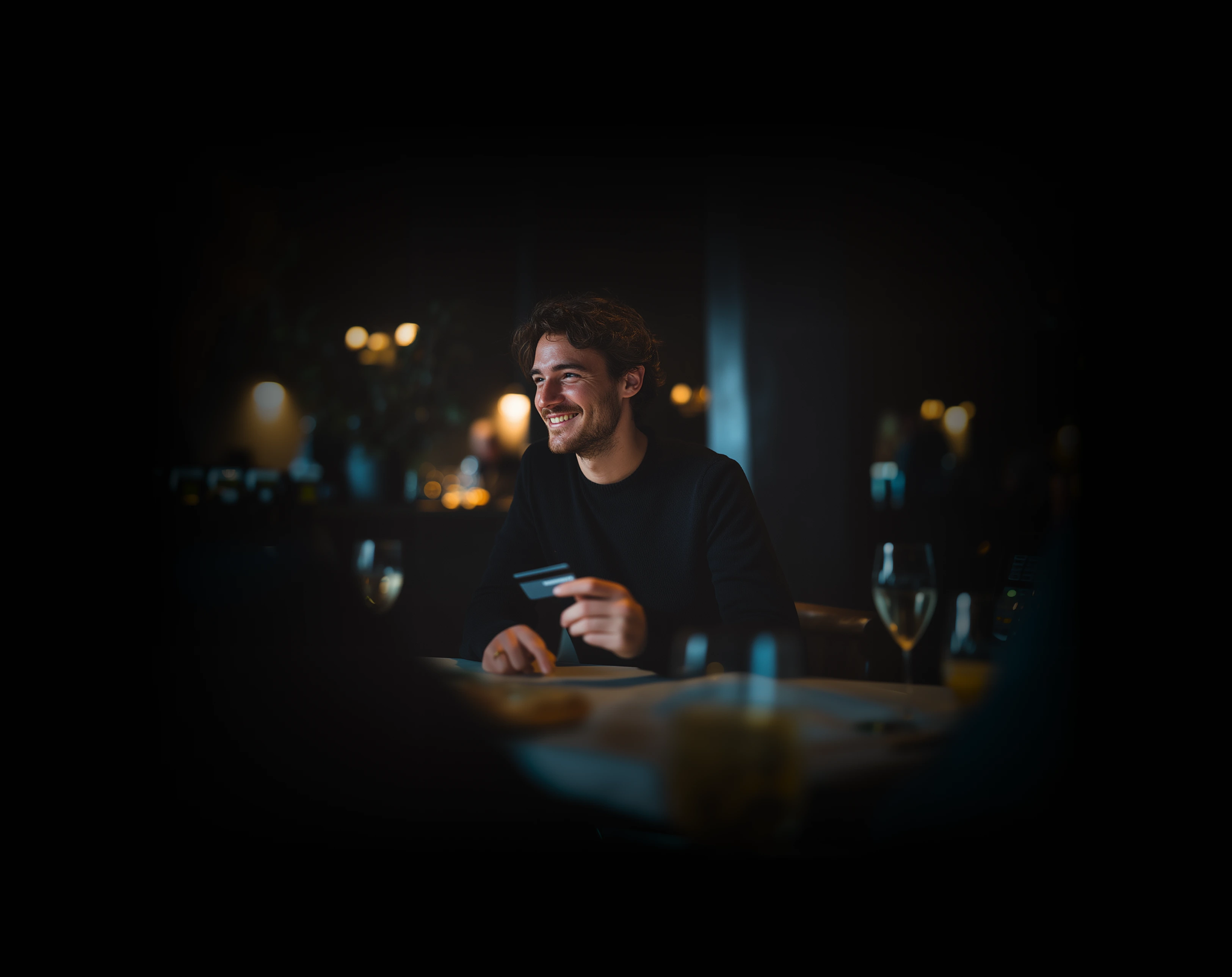 Man paying with a Zeal debit card at a restaurant—fast, contactless checkout.